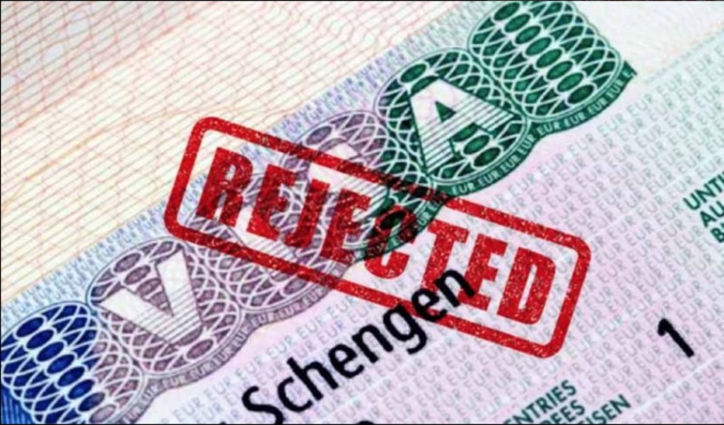 Visa officer reviewing application during Italy Schengen visa appointment UK in London.

